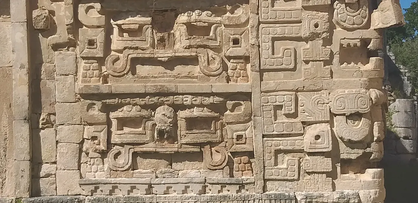 Stone relief detail on a Maya building at Chichen Itza