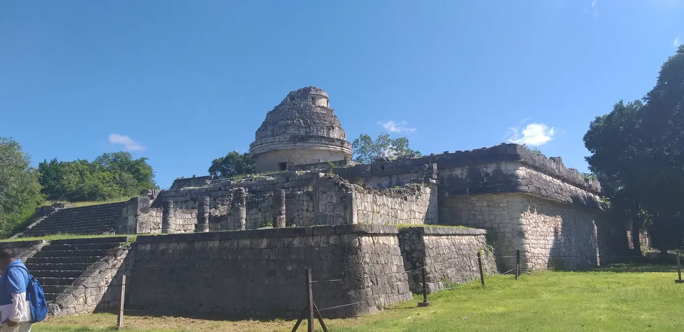 El Caracol observatory at Chichen Itza under a blue sky